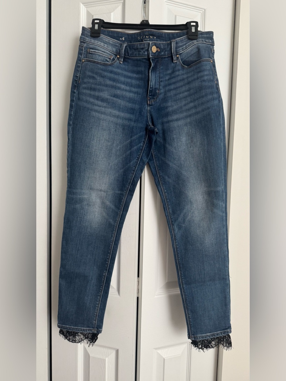 White House Black Market Blue Cropped Skinny Jeans with Lace Hem